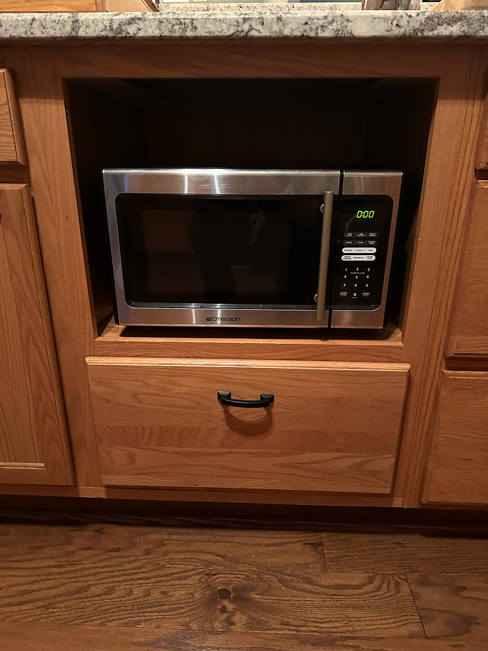 Before- Kitchen microwave cabinet